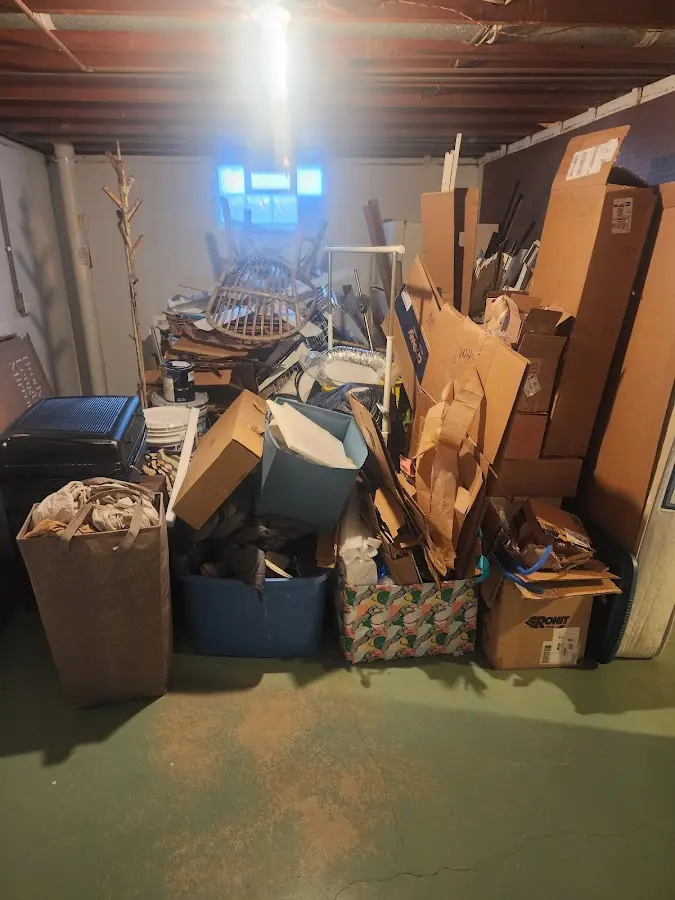 Roll-off dumpster container at job site for 2 Yard Dumpster Rental in Desert Palms